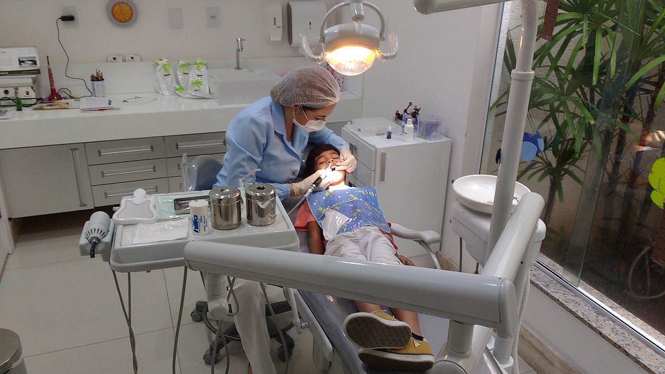 White Dental Equipment Near Wall · Free Stock Photo White Dental Equipment Near Wall · Free Stock Photo